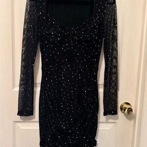 Elegant Black Dress with Sheer Sleeves